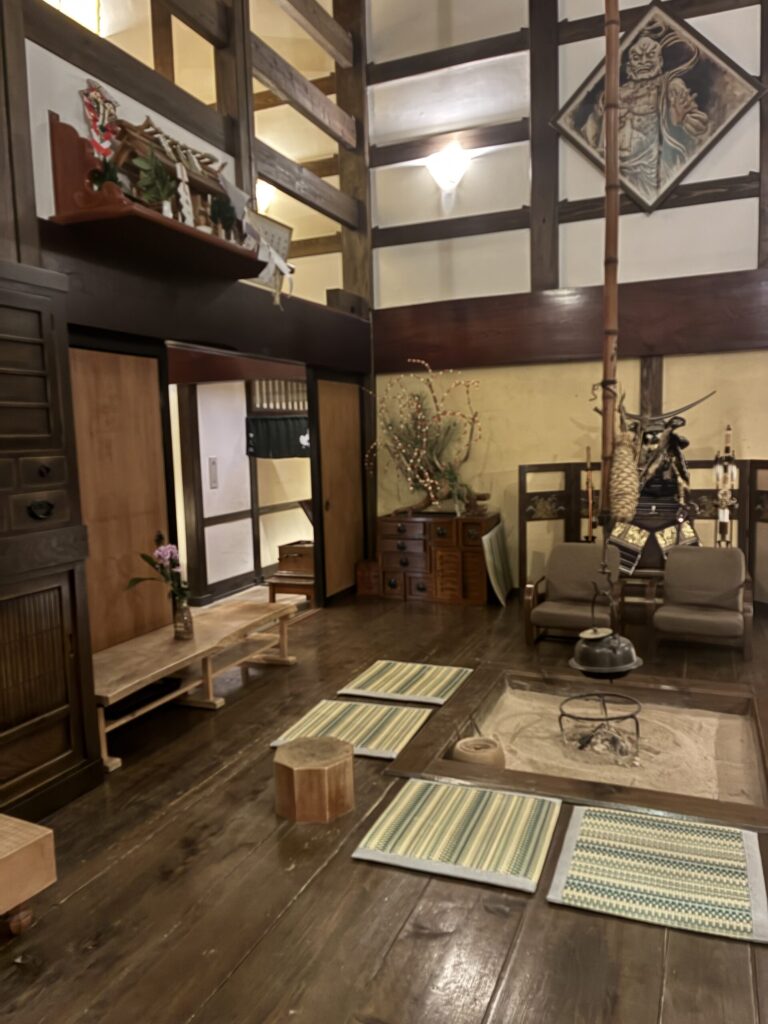 Detail of lacquered wood and traditional Japanese craftwork inside a Yarimikan ryokan guest room