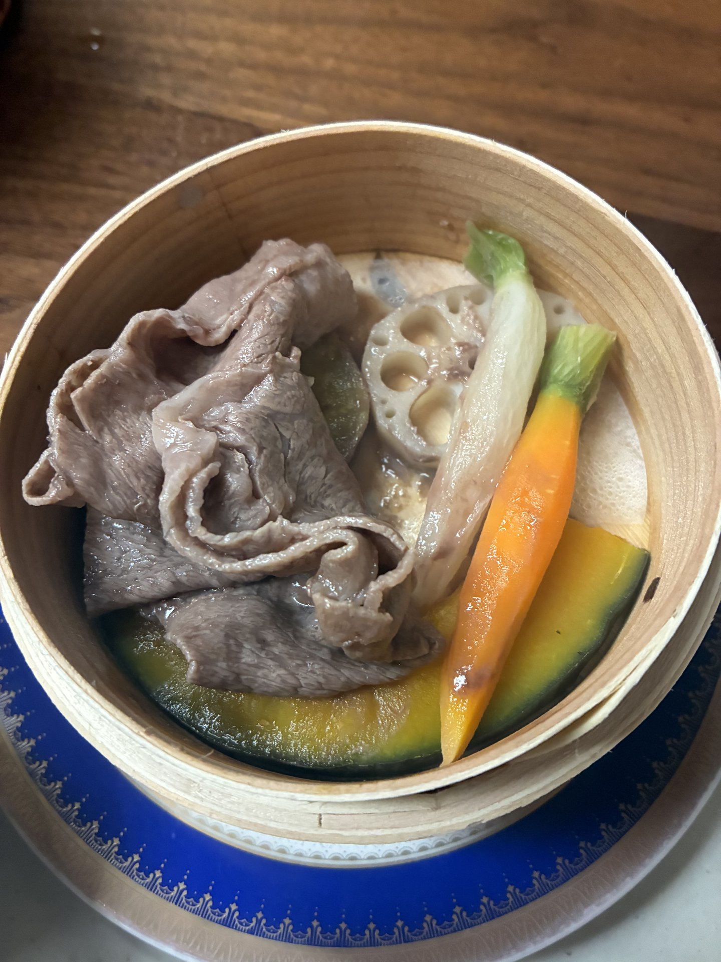 Seiro-mushi steamed Hida beef and seasonal vegetables in a bamboo basket on Night 2 at Yarimikan