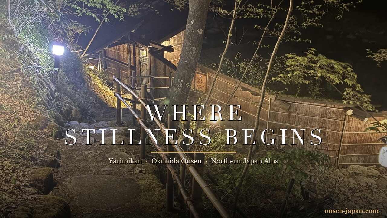 Yarimikan ryokan at night with stone steps and lanterns leading into the Okuhida onsen — a hidden hot spring in the Northern Japan Alps